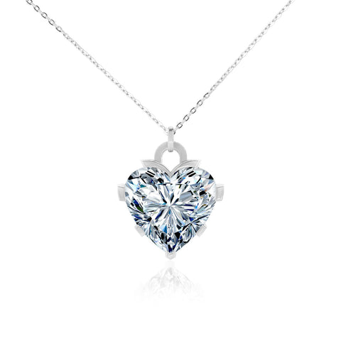 Juego Ice Heart - Collar y Aretes de corazón flotando en base de plata